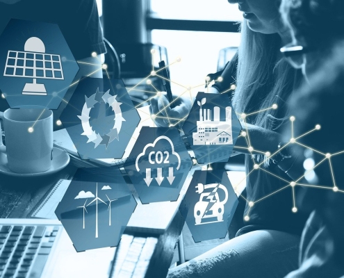 renewable-energy-g48f26ecbe_1280 renewable energy symbols overlaid on image of people working on laptops; Carbon credits and changing energy market