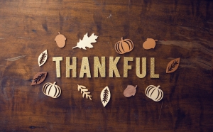 pro-church-media-p2OQW69vXP4-unsplash the word thankful on wooden background; Sharing Gratitude