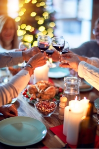 krakenimages-7BpuzmcxlHU-unsplash People connecting by sharing a traditional Christmas meal