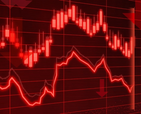 analysis-4937349_1280 black screen with red lines trending down; carbon credit values falling