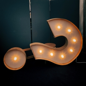 jon-tyson-hhq1Lxtuwd8-unsplash image of a question mark on its side; Carbon Credits and Changing Energy Market; market predictions for 2025