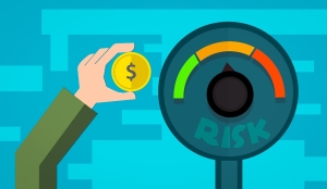 investing-4013413_1280 cartoon meter reading "risk" with colors green, orange, red and a hand holding a coin