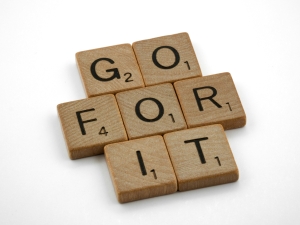 brett-jordan-MHS7g_q-6mE-unsplash scrabble tiles on white background; words spelling "go for it"