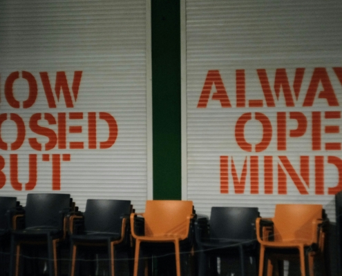 aliaksei-lepik-Y9zVKTjHYkY-unsplash image of storefront with "no closed but" "always open minded" written on it; Soft Skills Matter: Flexibility