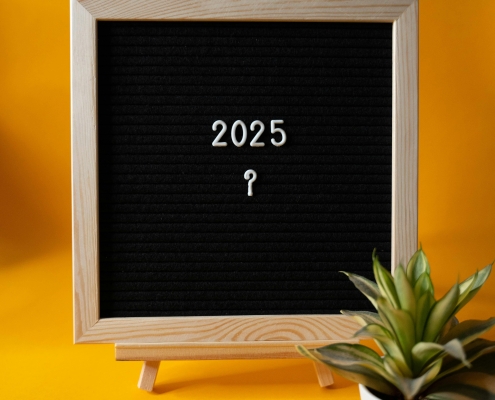 pexels-viridianaor-29996966 Black board with white frame and white numbers 2025 and question mark; what will the new year bring