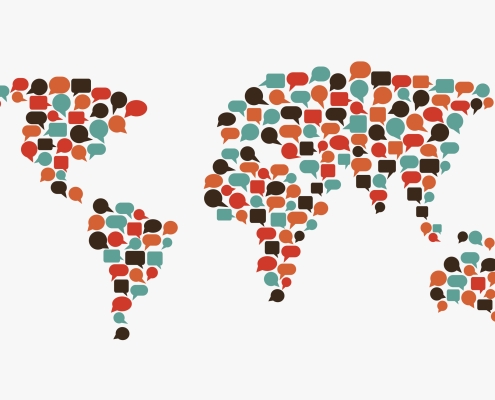 World map made of speech bubbles. Translating, interpreter, communication concept map of world made up of speech bubbles against a white background; International Buzz! international fuel pricing; words matter