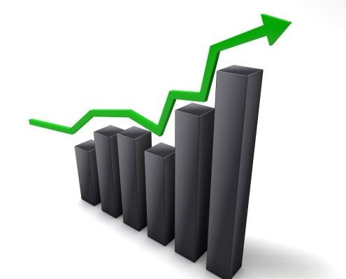 share-price-1013627_1280 image of black bars rising against white background with green arrow travelling up over top of the bars; current events - January 2025