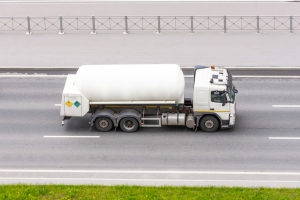 Truck with a large cylinder under high pressure liquefied propane gas, butane. white fuel truck on road; Hedging 301 - financial options - how to use them; Current Events - July 2025; Q&A with the Westlark Team