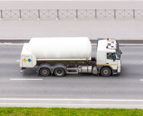 white fuel truck on road; Hedging 301 - financial options - how to use them; Current Events - July 2025; Q&A with the Westlark Team