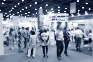 Abstract blurred event exhibition with people background, business convention show concept blurry image of people at a trade show