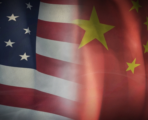 Flag 3D Rendering on Economic, Cooperation between The United States and China. US and Chinese flag images overlapping; symbolizing trade war; global supply shift