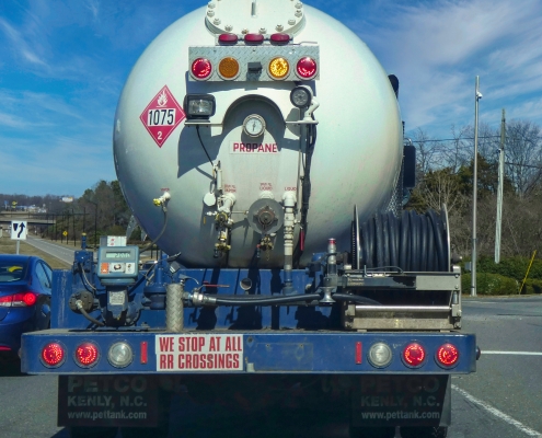 Propane gas tanker. view of the back of a fuel delivery truck; Hedging 301 - options - another way to use them