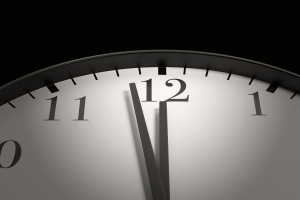 Round black and white clock with both the hour hand and minute hand almost pointing to 12 o'clock. Illustration of the concept of due date, deadline, countdown and doomsday clock with both hands nearly pointing to 12; Westlark Advisors' Client Appreciation Event Coming Soon