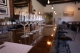 Image of wine glasses in a line on a bar in an elegant room, soft lighting; Appreciation is the Theme - Westlark