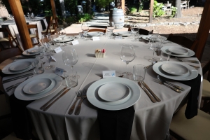 RRV Dinner Setting with Westlark name plate table set for elegant dinner with white linens, china, crystal, etc; Appreciation Westlark Client Event