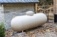white propane tank next to side of stone building; Westlark Advisors in BPN