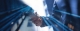 handshake against blurred background with blurred lines coming from the arms ; commodity management you can trust