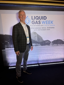 JD at WLGA sign JD Buss in front of World Liquid Gas Week 2025 sign