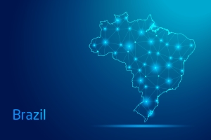 Brazil map - concept of communication technology, graphic of low poly. map of Brazil on dark blue background with lights; energy market highlight