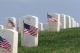 tombstones in cemetery with American flags, Memorial Day Honor by Remembering