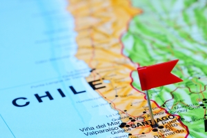 Santiago pinned on a map of Chile map of Chile with tiny flag; atlas style, close up of map